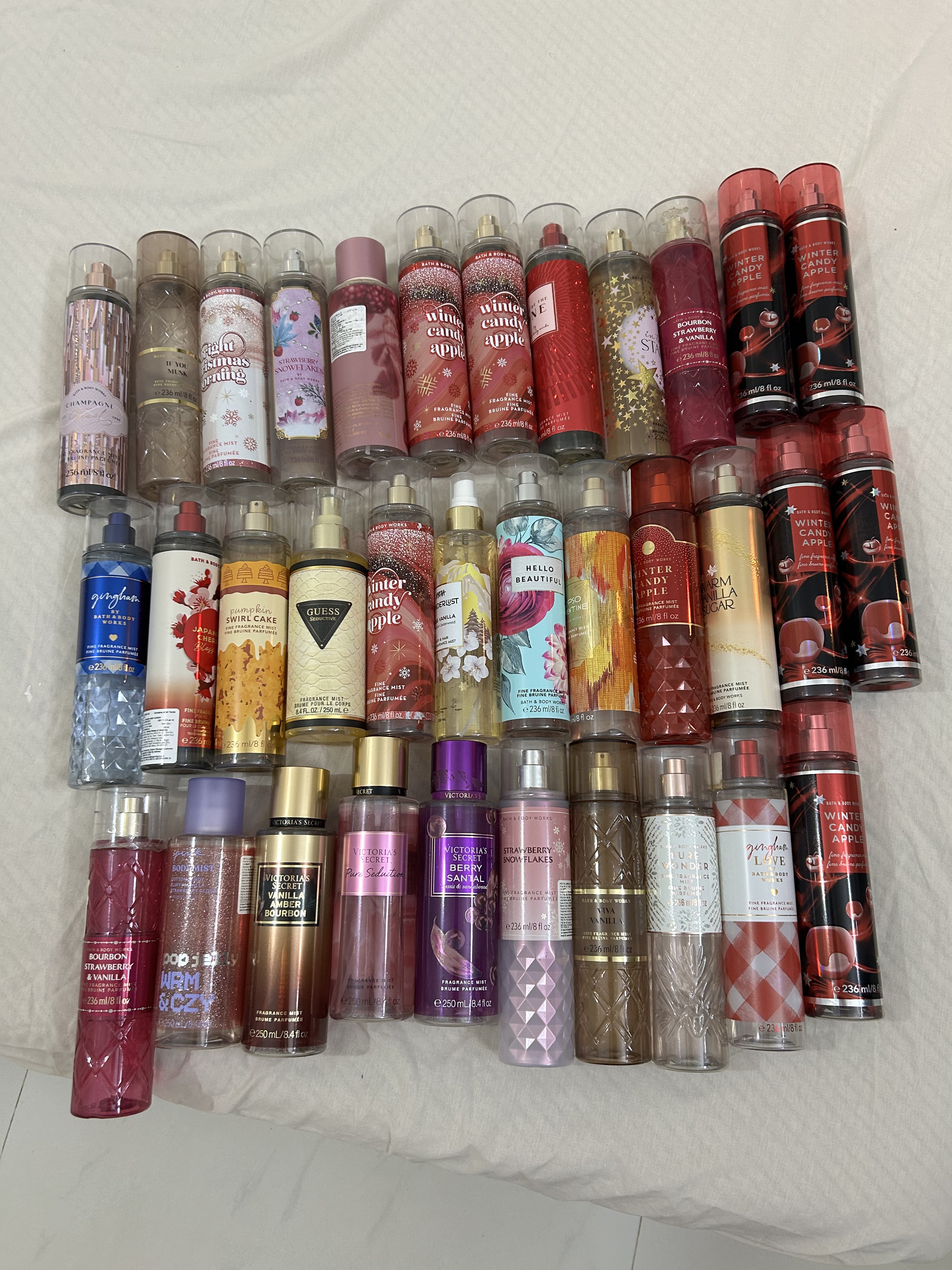 A shelf of body-mist bottles, several rows deep